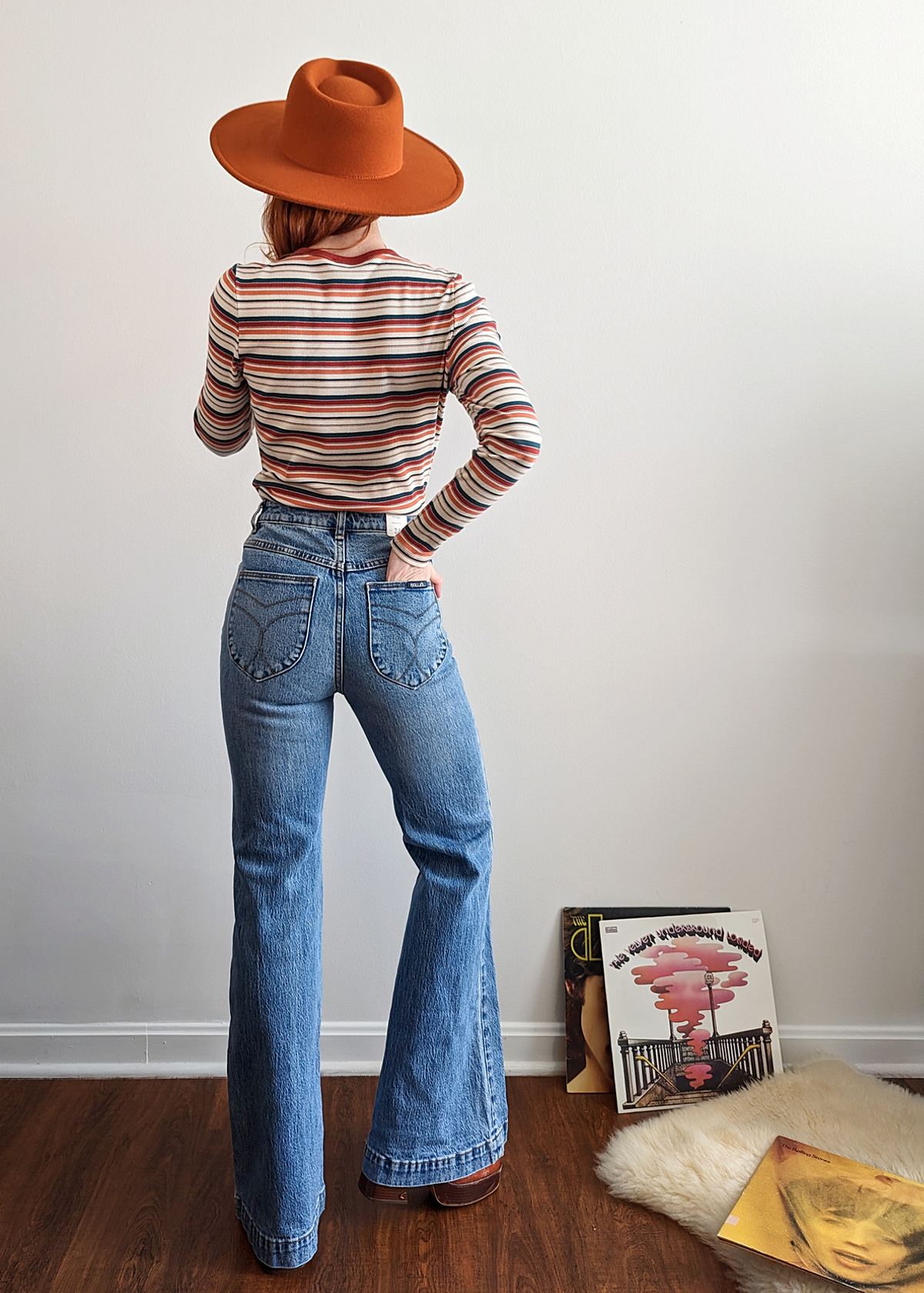 The Rolla's Jeans Salty Blue Denim Eastcoast Flares. 70s inspired bell bottom jeans with a high rise waist and faded blue denim wash.