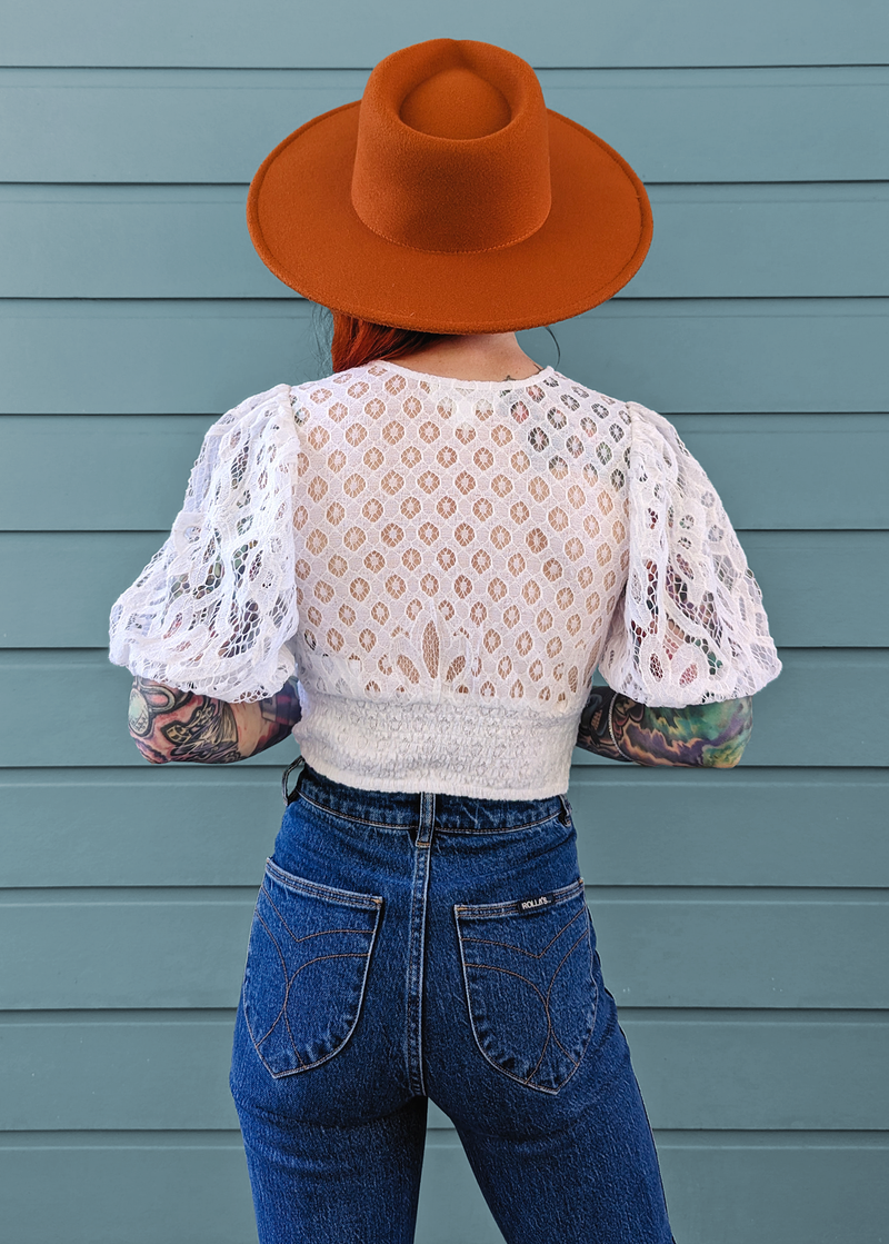 70s inspired white lace smocked tie front top with puff sleeves by Band of the Free