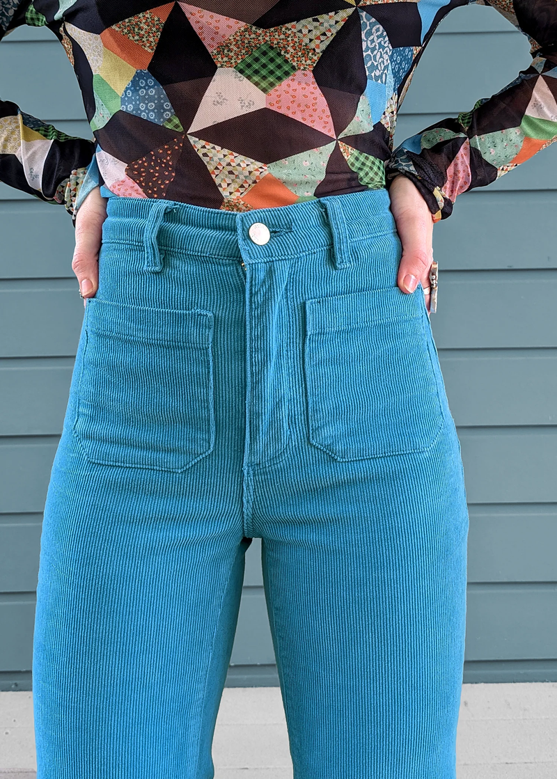 70s inspired cornflower light blue corduroy eastcoast flares with high rise waist and sailor patch front pockets, by Rolla's Jeans