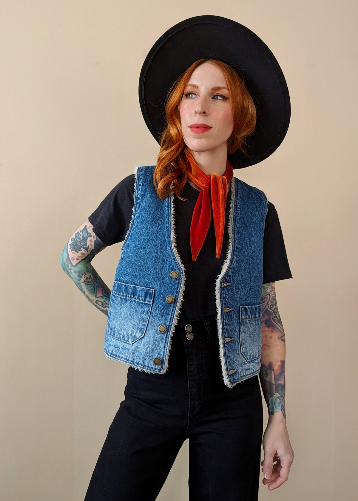 The Stevie Denim Vest by Rolla's Jeans: 70s inspired blue denim vest with cream sherpa lining. Features a boxy fit, patch sailor pockets, and a button front. Reversible! 