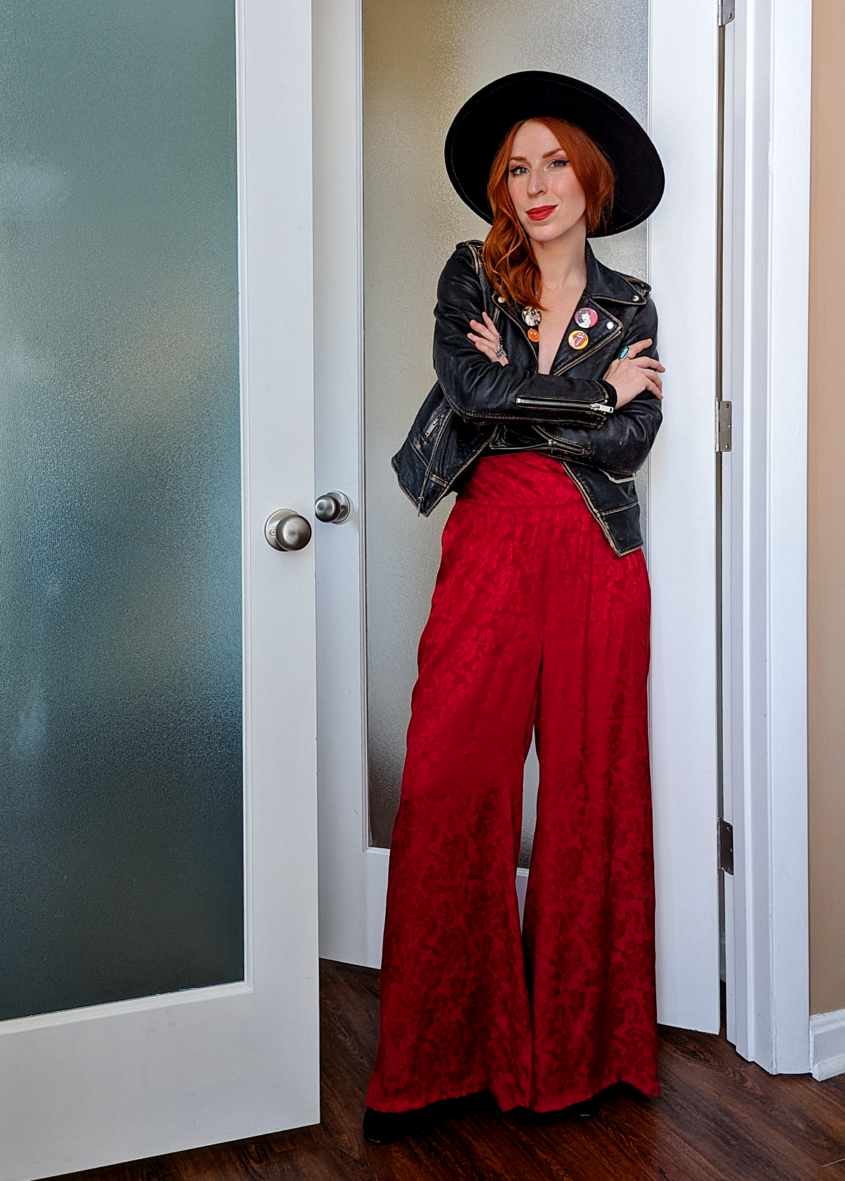 80s inspired ruby red satin wide leg pants with a wide waistband, elastic back of waist, and tonal floral pattern throughout