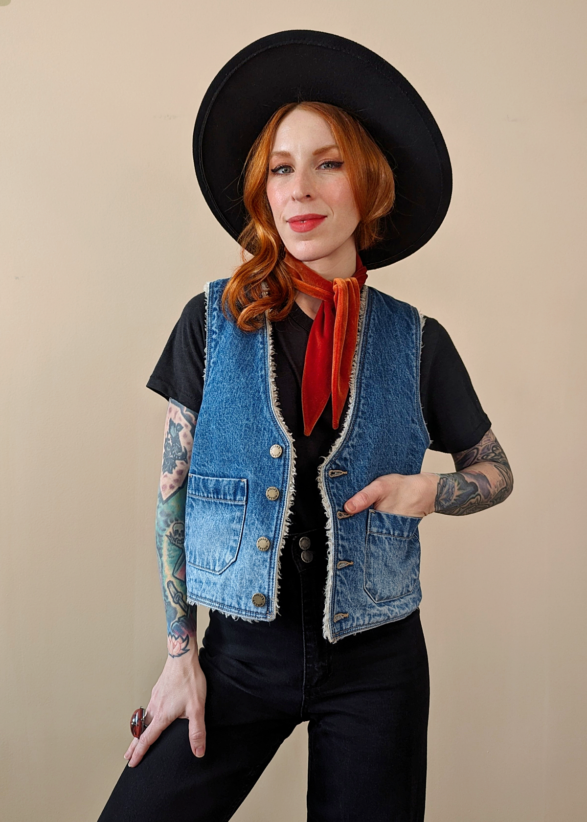 The Stevie Denim Vest by Rolla's Jeans: 70s inspired blue denim vest with cream sherpa lining. Features a boxy fit, patch sailor pockets, and a button front. Reversible! 