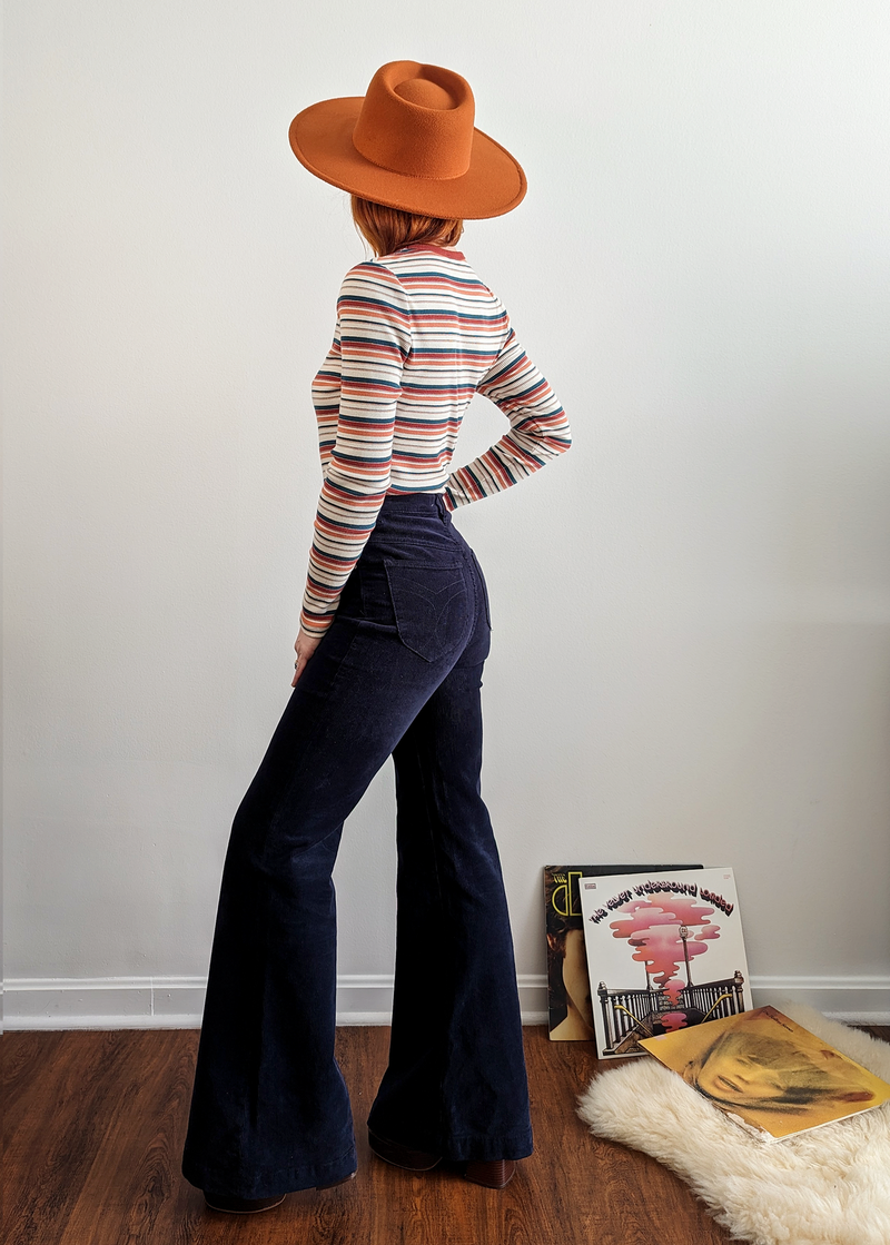Rolla's Jeans Navy Corduroy Eastcoast Flare: Retro 70s inspired bell bottoms with a high rise waist and velvety soft thin wale corduroy.