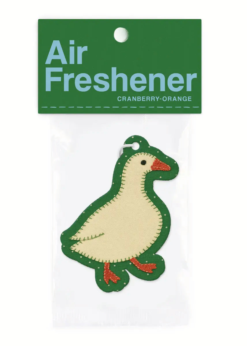 Air freshener shaped like a goose with a green label on a white background
