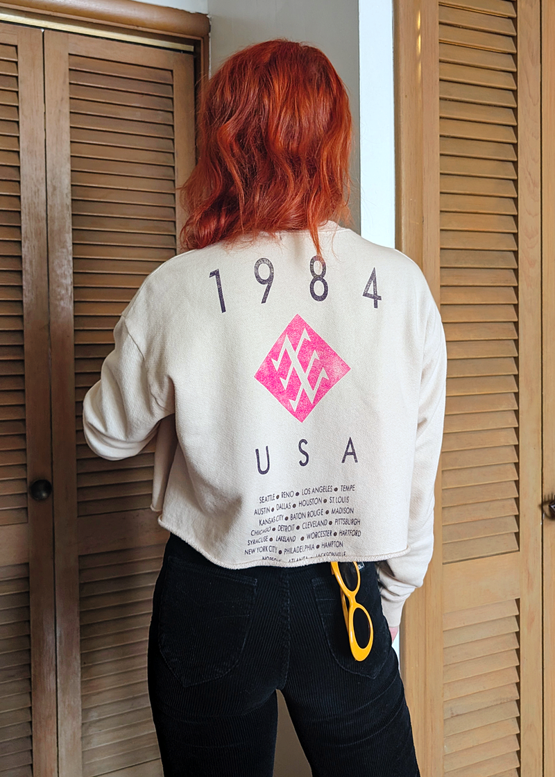 Duran Duran Seven and the Ragged Tiger Crop Sweatshirt by Daydreamer LA - back view of sweatshirt that has "1984 USA Tour Date" Graphics