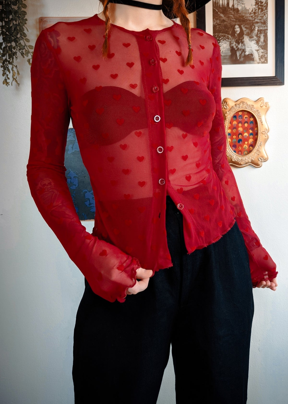 90s inspired Valentine deep red slinky mesh button front top with red flocked velvet hearts all over. Lettuce trim at cuffs and hem. By Motel Rocks