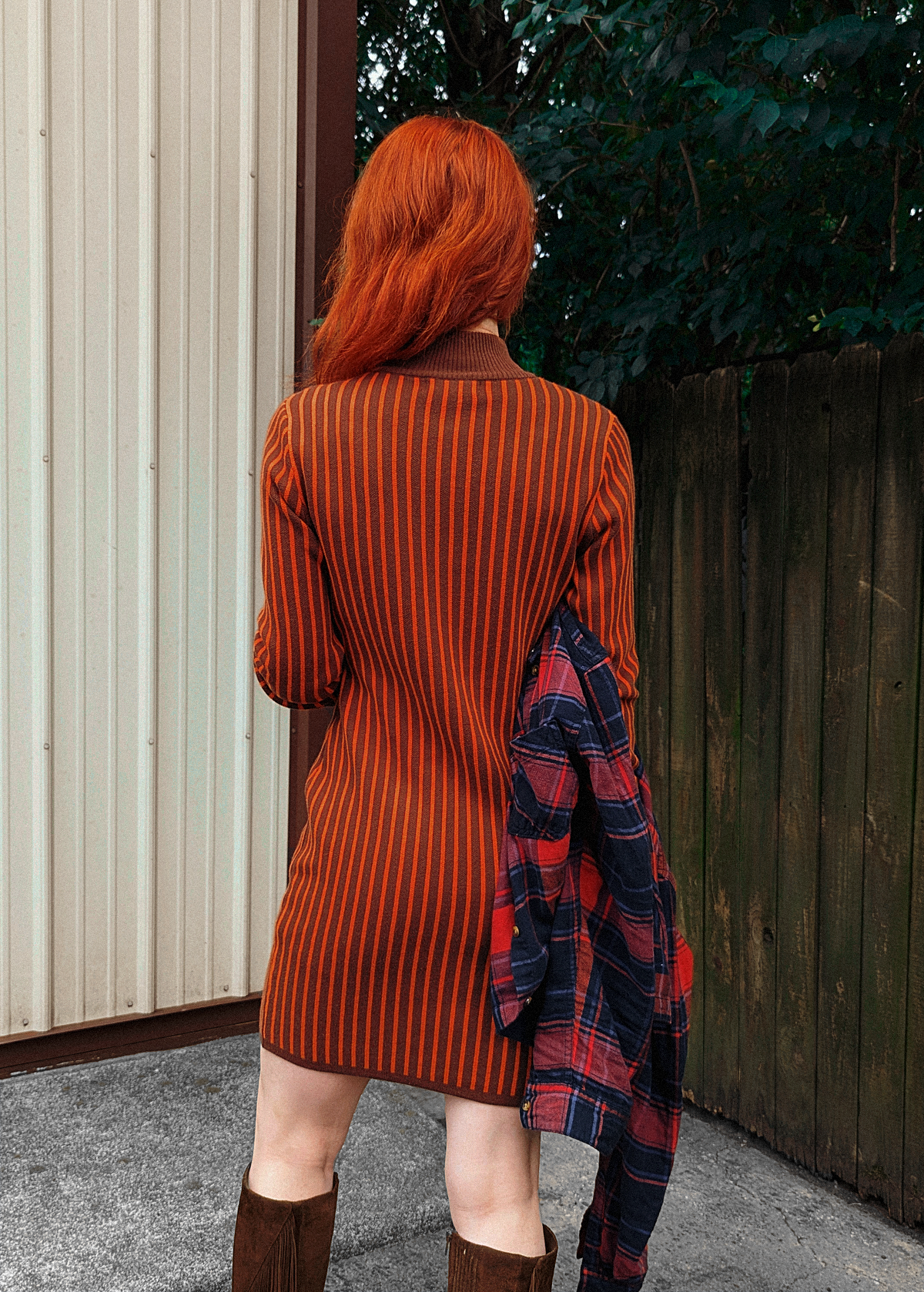 70s meets 90s with this Organic Cotton Knit Mock Neck Zip Front Mini Dress in Orange and Brown Stripe by Another Girl