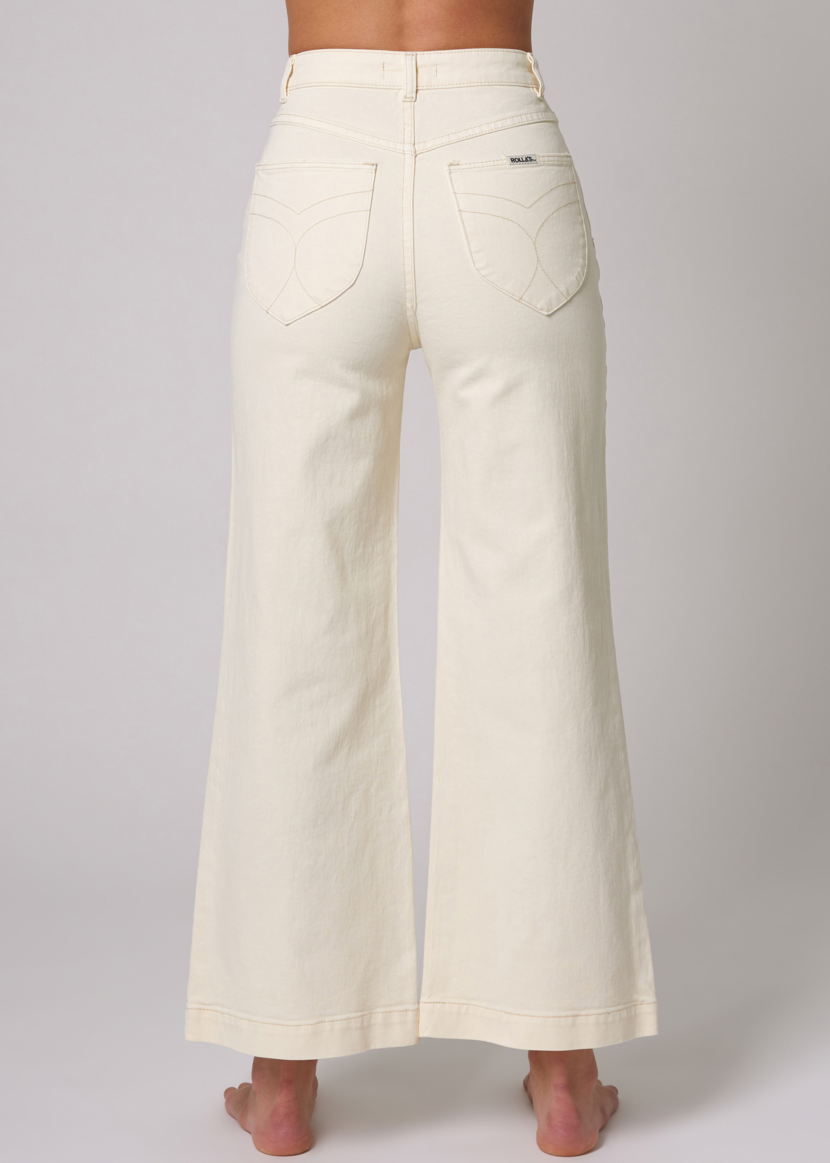 Rolla's Jeans Buttercream Ivory Sailor Jean with a high rise waist, patch front pockets, and wide, cropped ankle length leg