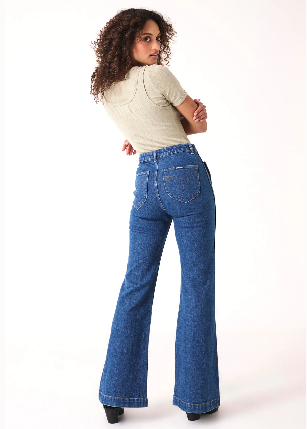 70s inspired organic cotton stretch Charlotte blue denim Eastcoast Flares with high rise waist and patch front pockets by Rolla's Jeans