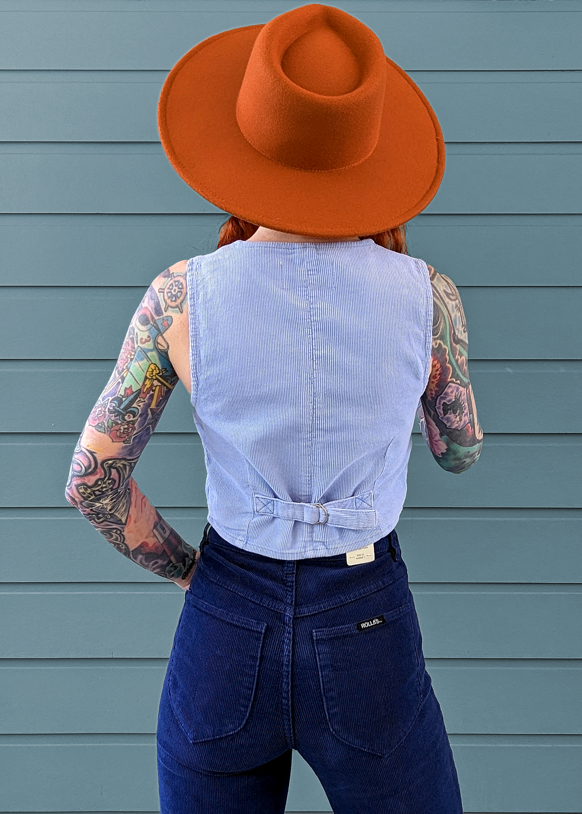 Rolla's Jeans Wisteria Blue Corduroy Dallas Vest. 70s inspired and features a v-neckline, button front, and adjustable buckle at back.