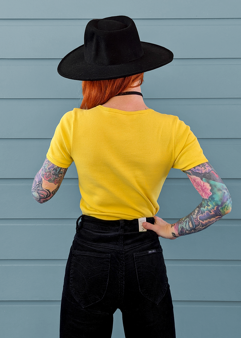 70s inspired golden yellow rib ringer tee with Rolla's bubble graphics at front in black, by Rolla's Jeans