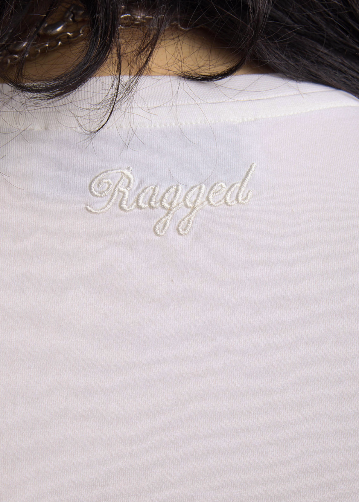 Ivory shirt with 'Ragged' embroidered at back of neck