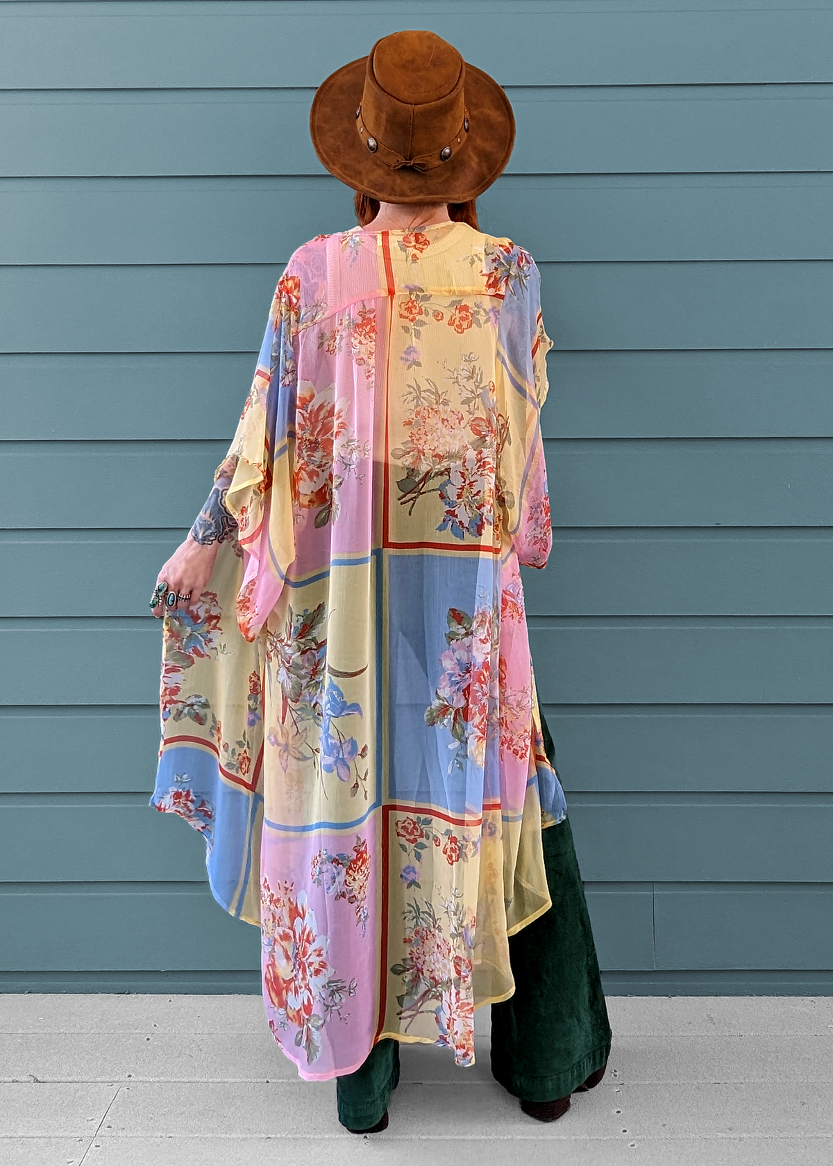 70s inspired floaty chiffon duster kimono with blue, pink, and yellow patchwork floral design.