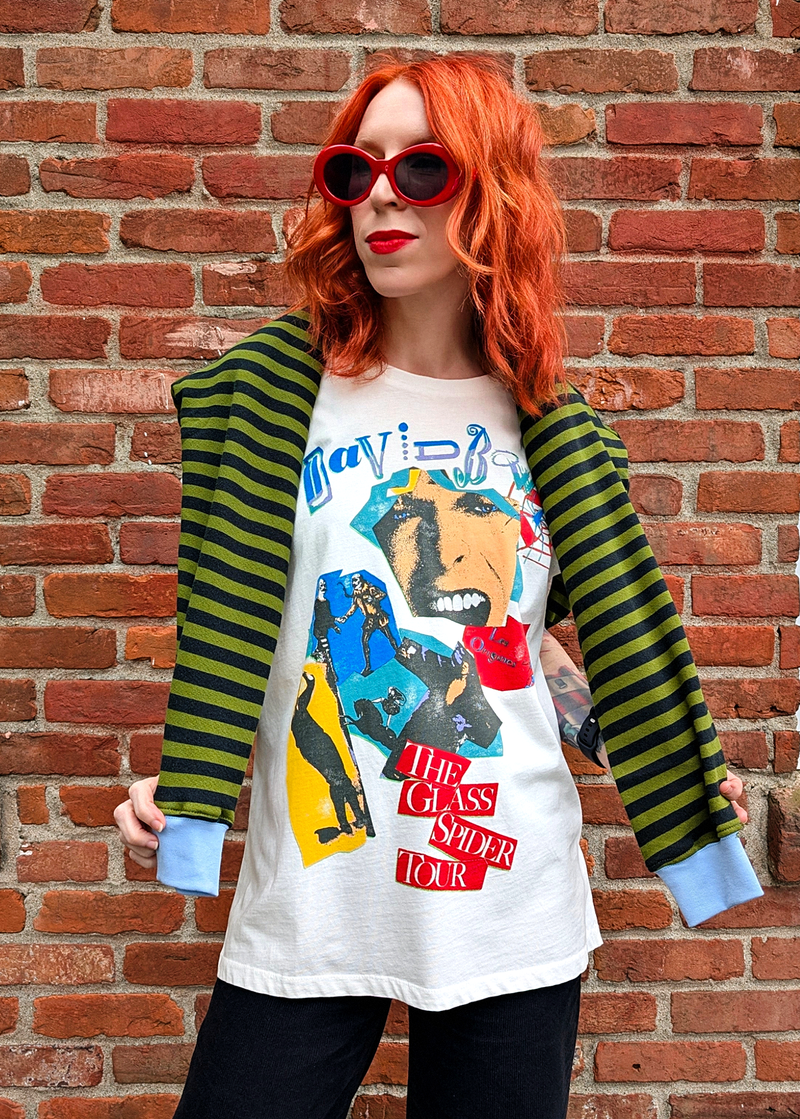 Slouchy, oversized fit tee with colorful David Bowie The Glass Spider Tour graphics at front. Made in the USA and officially licensed