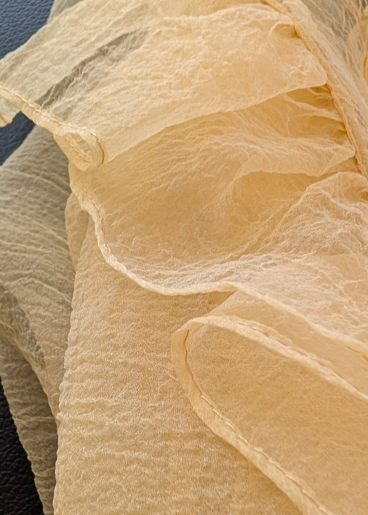 Close-up of butter yellow fabric texture