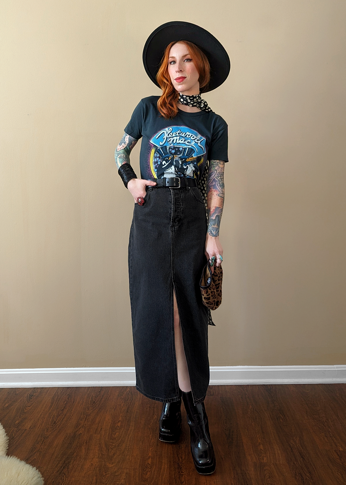 Retro 80s inspired ash black denim Chicago midi skirt with front slit and high rise waist with button fly. By Rolla's Jeans