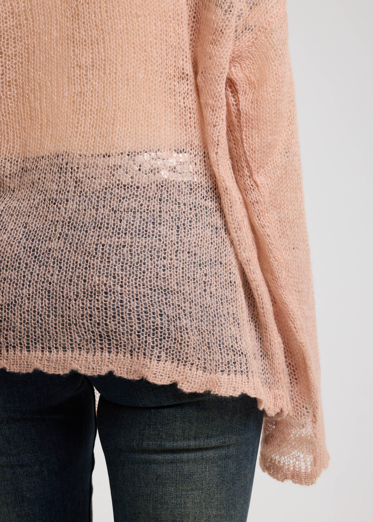 close up details of the dusty pink knit sweater 