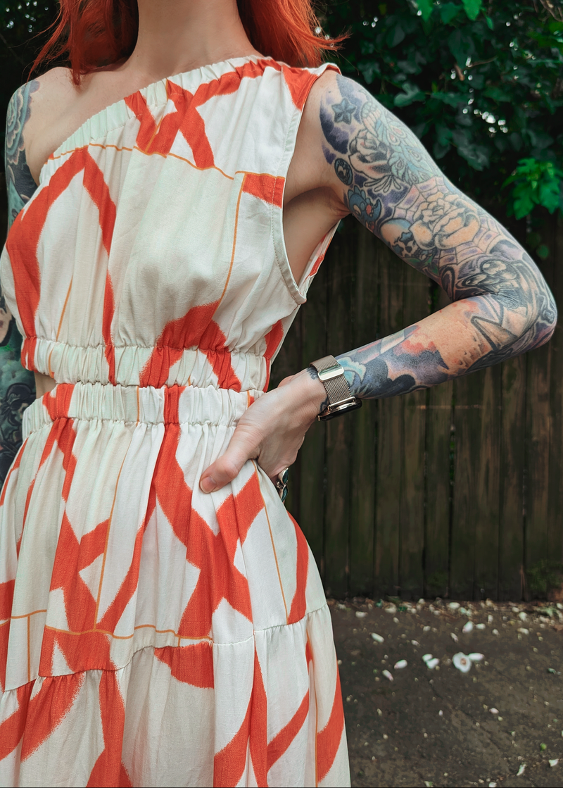Little Lies Yasmin One Sleeve Midi-Maxi Dress. Beige and Orange abstract pattern in a linen Tencel fabrication