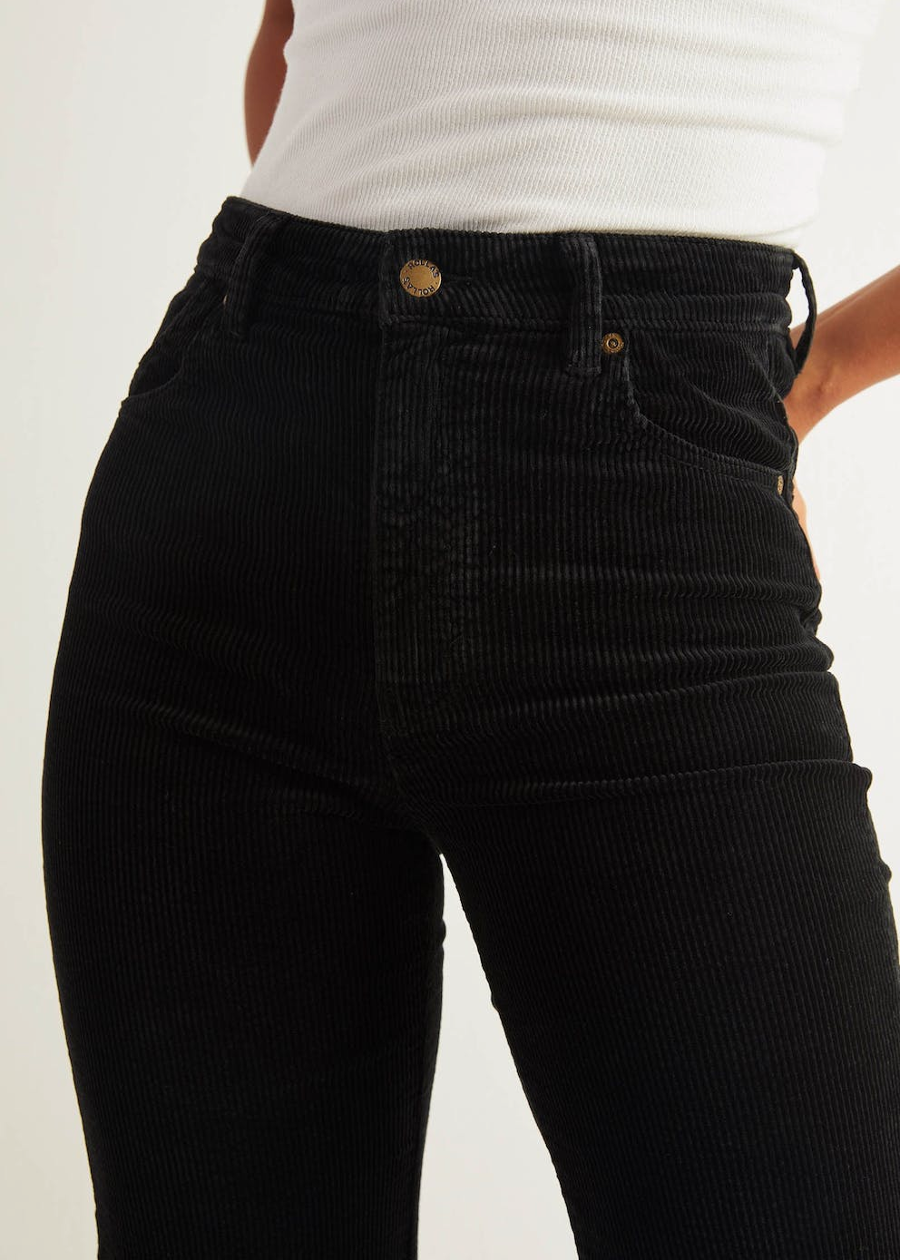 Rolla's Jeans Black Velvet Corduroy Eastcoast Flares: 70s inspired bell bottoms with a high rise waist, wide wale corduroy and a flare leg.