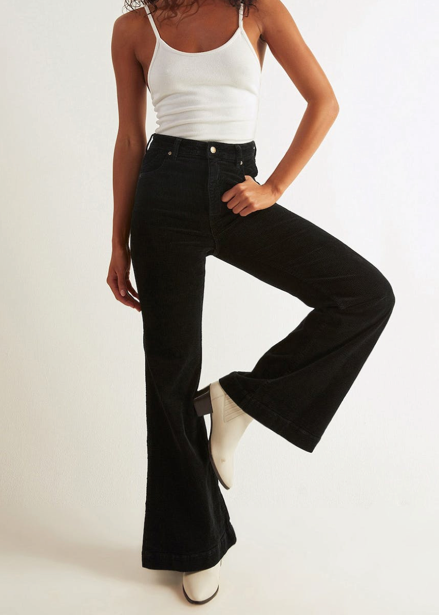 Rolla's Jeans Black Velvet Corduroy Eastcoast Flares: 70s inspired bell bottoms with a high rise waist, wide wale corduroy and a flare leg.