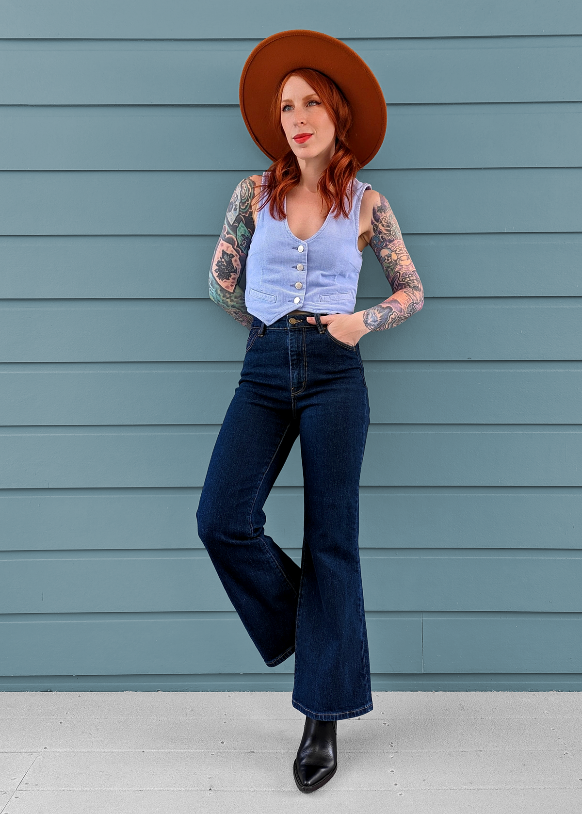 Rolla's Jeans Ankle Crop Eastcoast Denim Flares in Lux Blue: 70s inspired with a high rise waist, cropped ankle length kick flare leg, and a dark blue denim wash. Made of organic cotton denim.