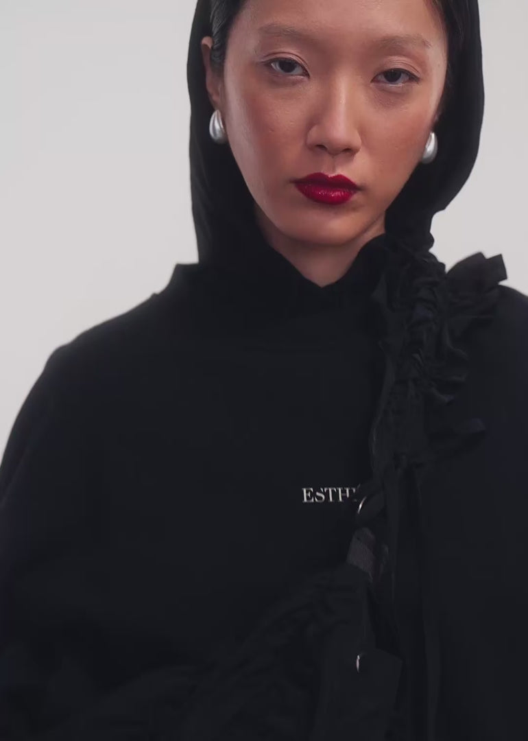 video of dress worn with a black hoodie