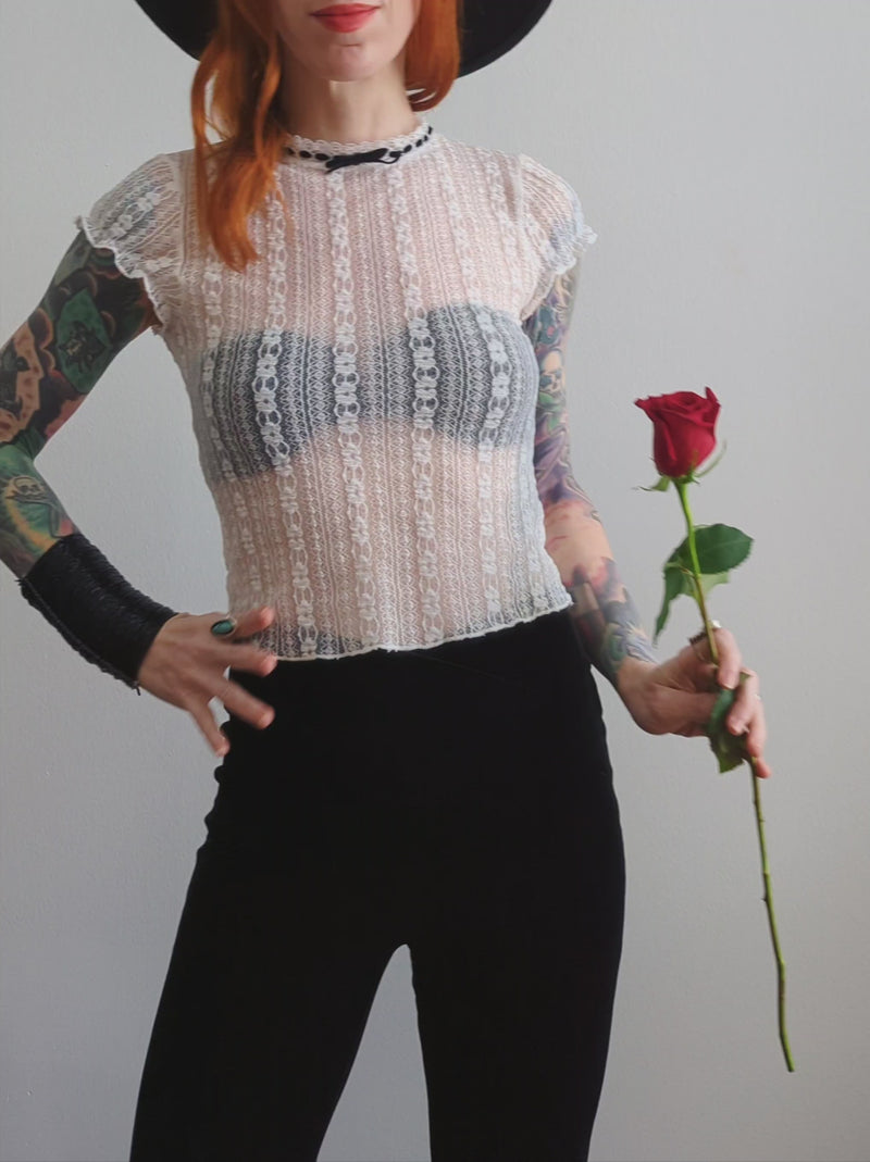 Romantic 90s inspired unlined sheer white lace cap sleeve top with velvet bow detail, by Motel Rocks