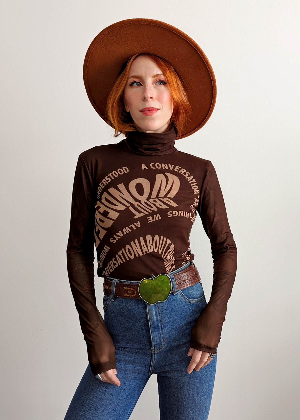 70s 90s inspired slinky stretch brown mesh turtleneck top with typeface graphics at front by Rationalle