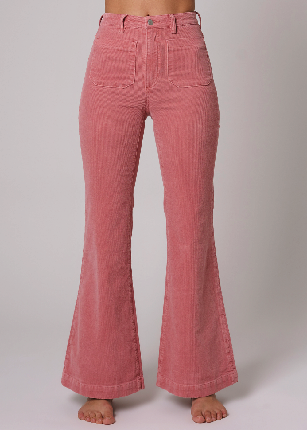Retro 70s inspired Rolla's Eastcoast Corduroy Flare Bell Bottoms with Sailor Patch Pockets. Rose pink colorway. 