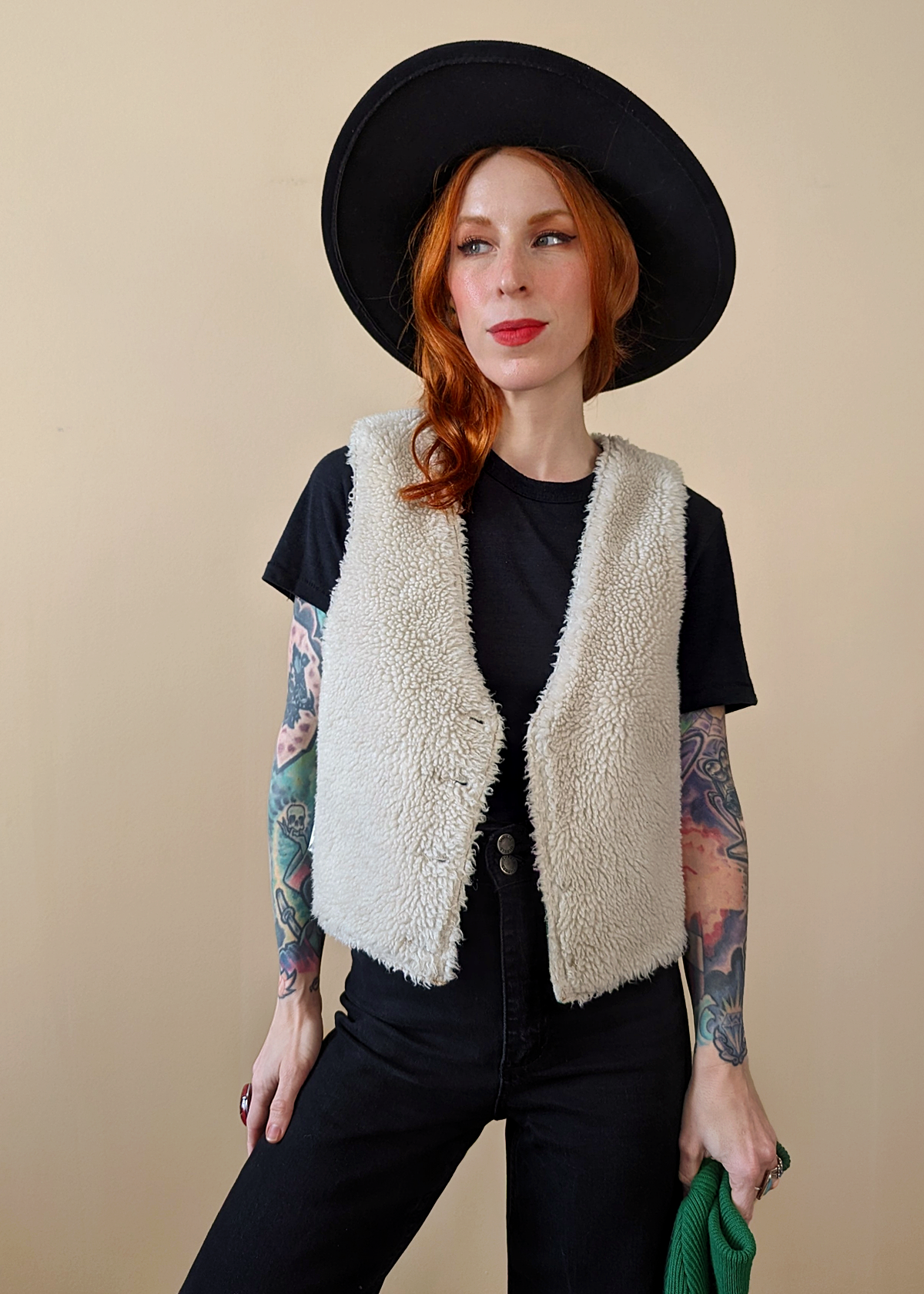 The Stevie Denim Vest by Rolla's Jeans: 70s inspired blue denim vest with cream sherpa lining. Features a boxy fit, patch sailor pockets, and a button front. Reversible! 