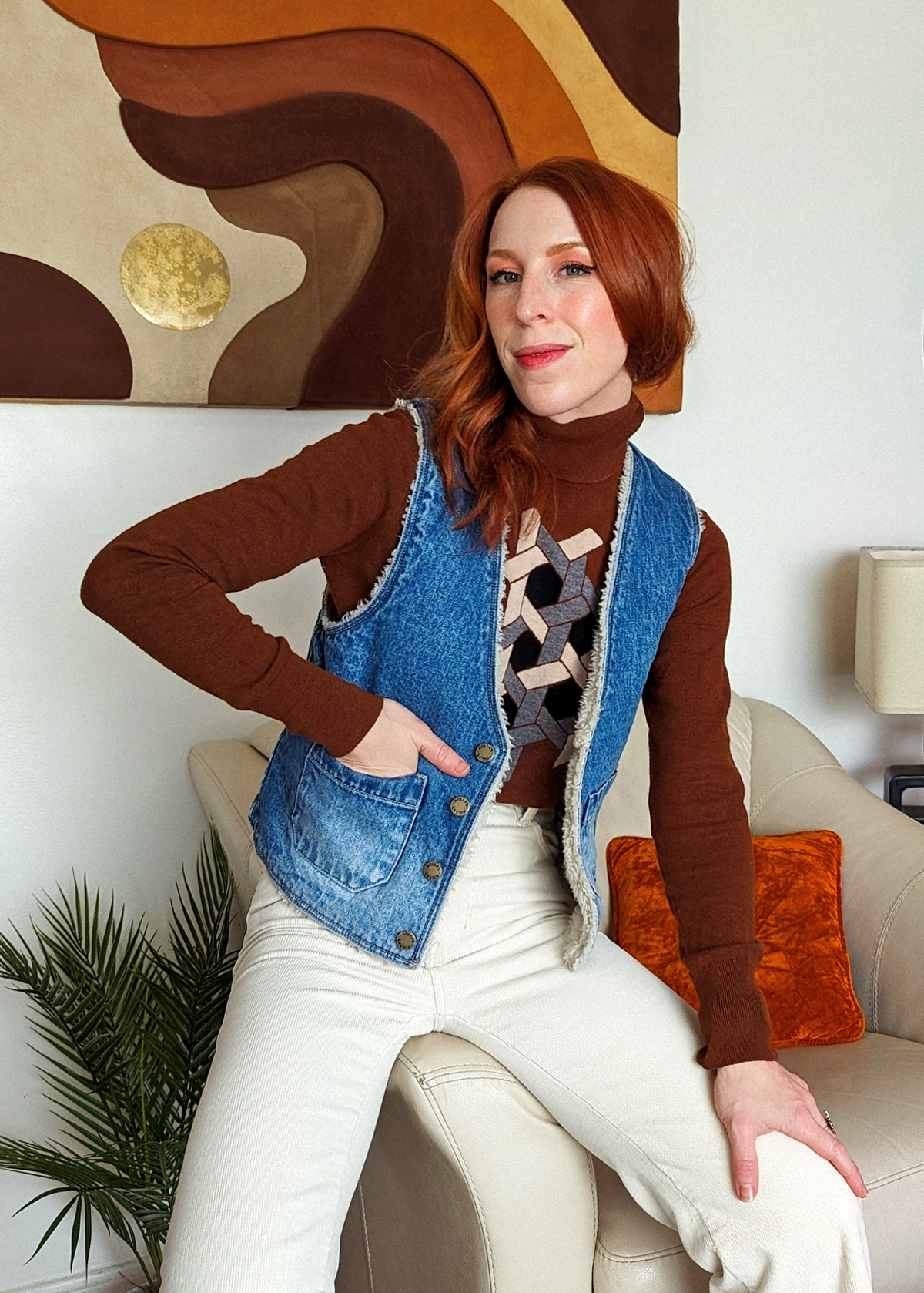 The Stevie Denim Vest by Rolla's Jeans: 70s inspired blue denim vest with cream sherpa lining. Features a boxy fit, patch sailor pockets, and a button front. Reversible! 