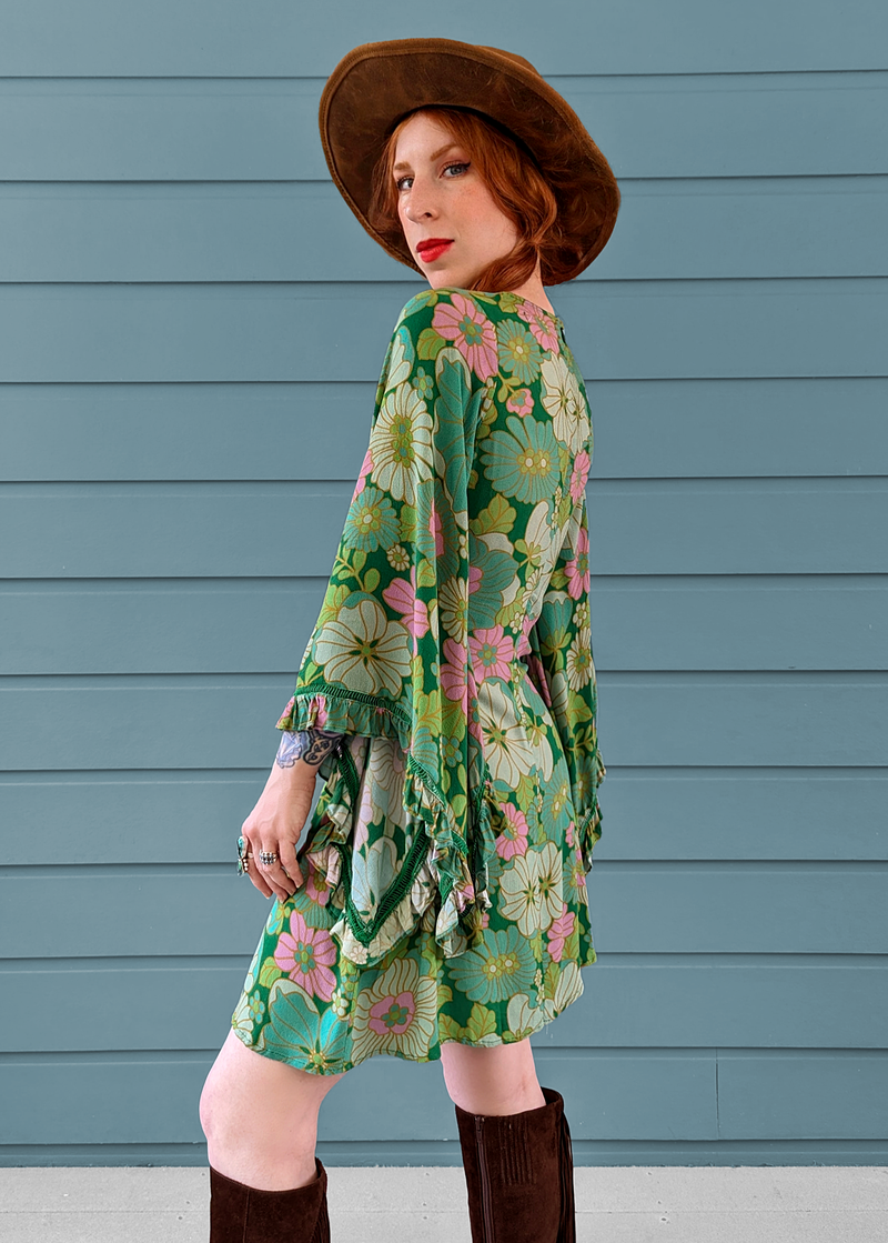 60s 70s inspired Angel Bell Sleeve Vixen Mini Dress in Arcadia green and pink floral by Nine Lives Bazaar