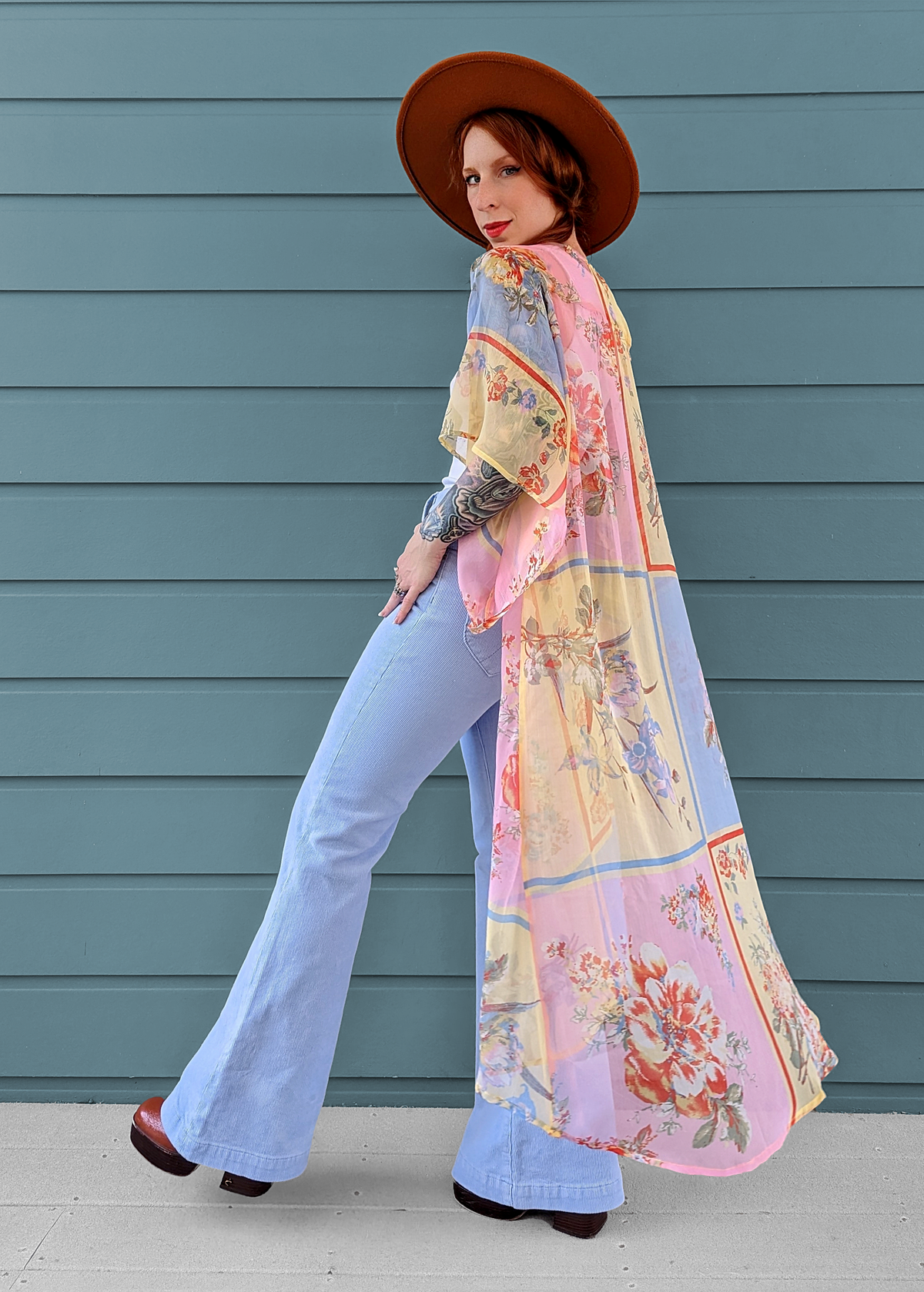 70s inspired floaty chiffon duster kimono with blue, pink, and yellow patchwork floral design.