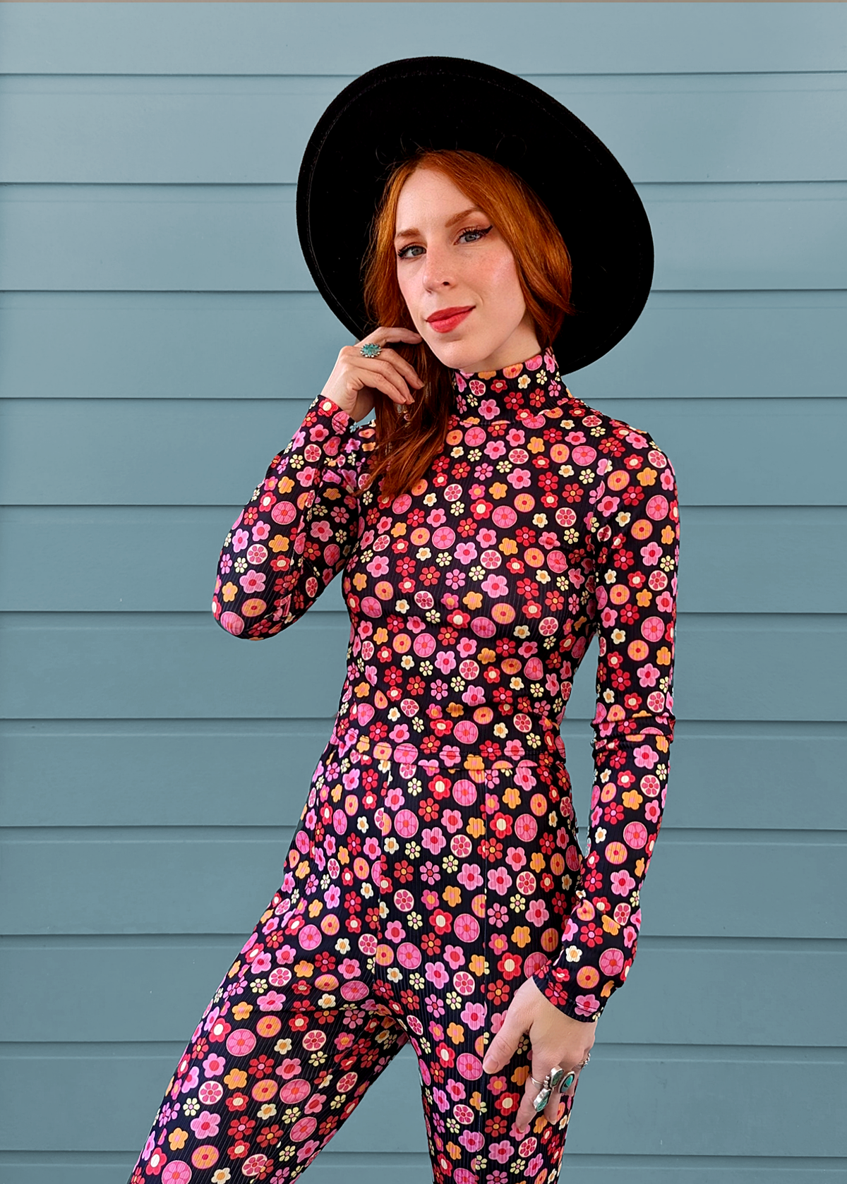 60s floral stretch rib mock neck long sleeve crop top with daisy pattern in black, pink, orange by Glamorous UK