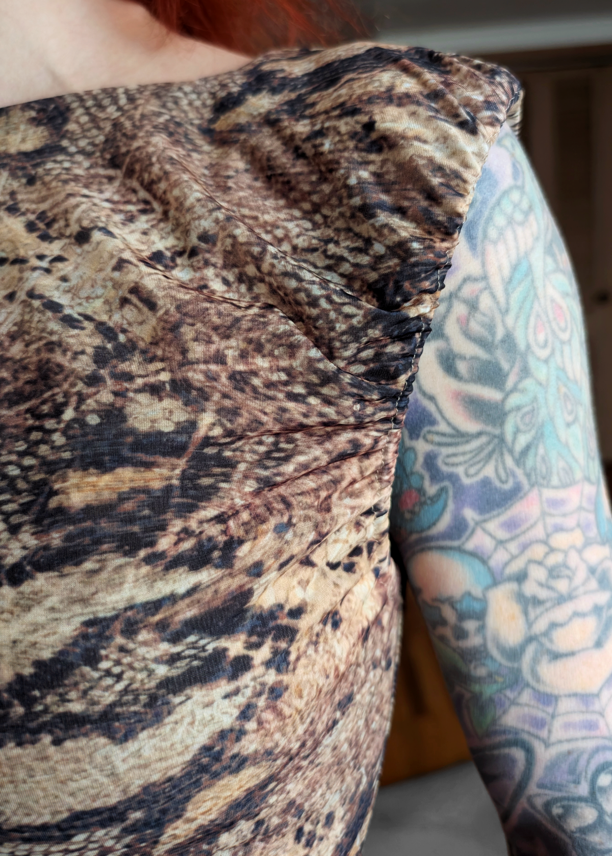 Close-up of snakeskin mesh patterned fabric