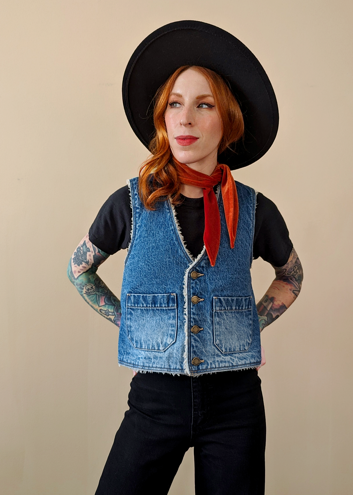 The Stevie Denim Vest by Rolla's Jeans: 70s inspired blue denim vest with cream sherpa lining. Features a boxy fit, patch sailor pockets, and a button front. Reversible! 