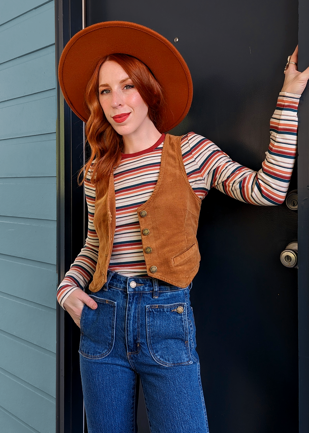 Rolla's Jeans Tan Corduroy Dallas Vest. 70s inspired vest featuring a v-neckline, button front, and adjustable buckle back. 