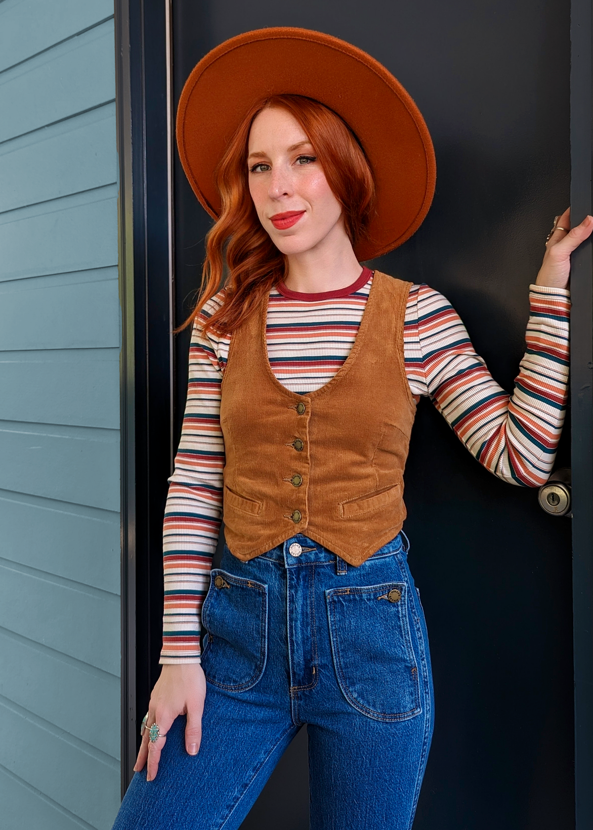 Rolla's Jeans Tan Corduroy Dallas Vest. 70s inspired vest featuring a v-neckline, button front, and adjustable buckle back. 