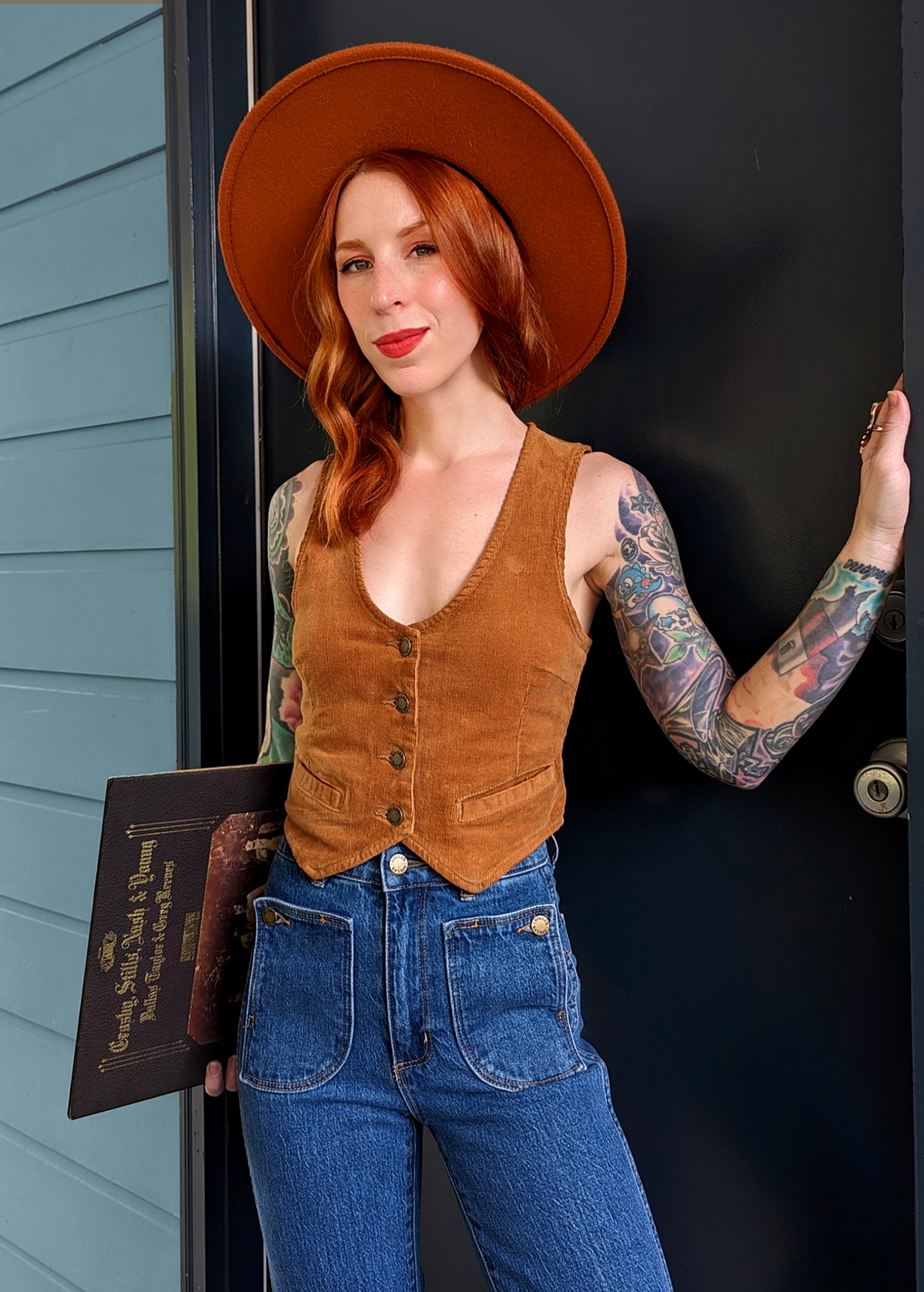 Rolla's Jeans Tan Corduroy Dallas Vest. 70s inspired vest featuring a v-neckline, button front, and adjustable buckle back. 