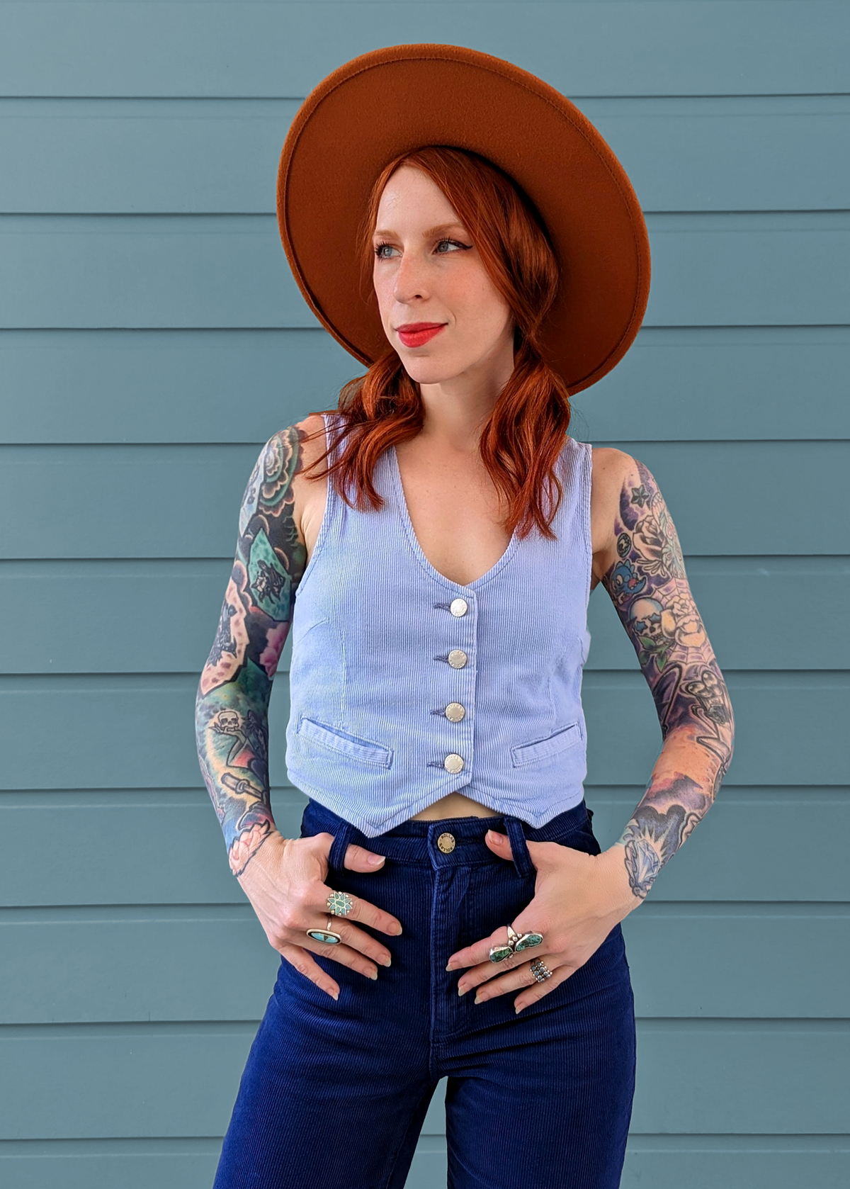 Rolla's Jeans Wisteria Blue Corduroy Dallas Vest. 70s inspired and features a v-neckline, button front, and adjustable buckle at back.