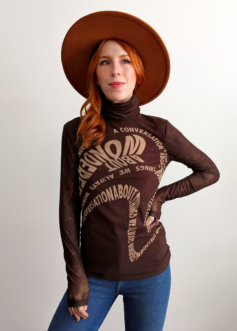 70s 90s inspired slinky stretch brown mesh turtleneck top with typeface graphics at front by Rationalle