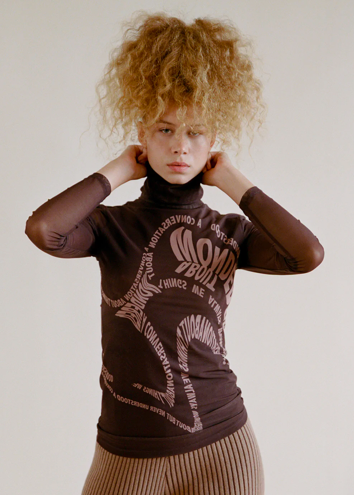 70s 90s inspired slinky stretch brown mesh turtleneck top with typeface graphics at front by Rationalle