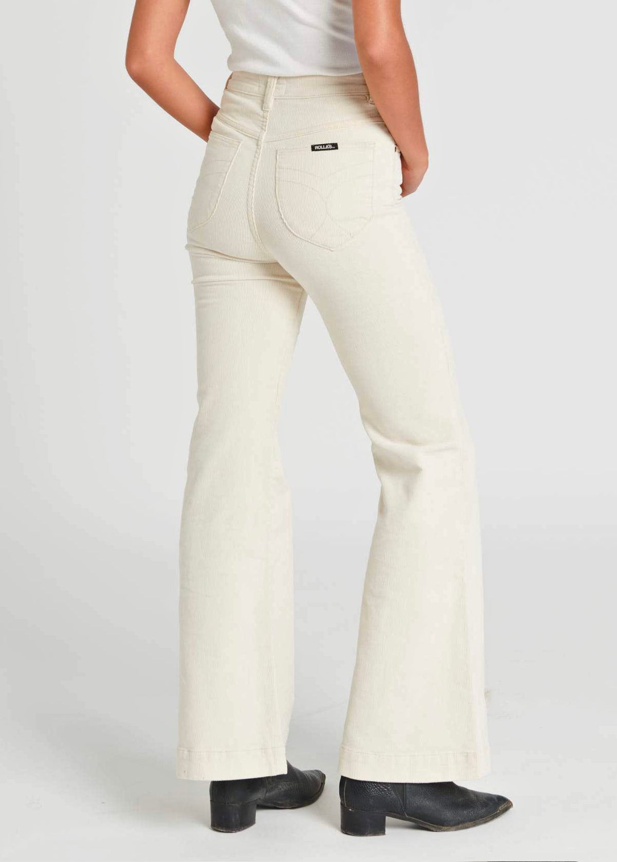 The Vanilla Cream Eastcoast Corduroy Flares by Rolla's Jeans. 70s inspired and features a high Rise waist, bell bottom leg, all in a vanilla cream corduroy