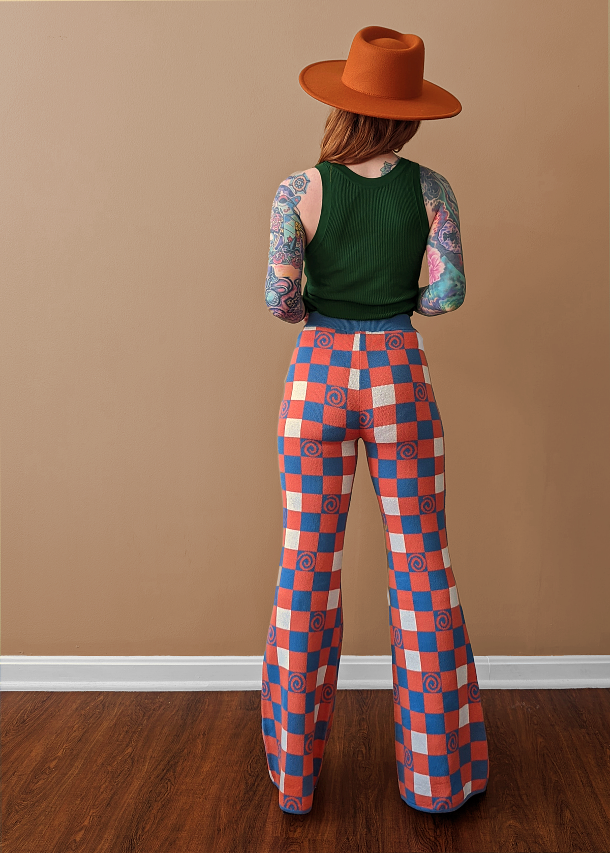 70s inspired orange, blue and white check and swirl organic cotton knit flares by Another Girl, sustainable and ethically made