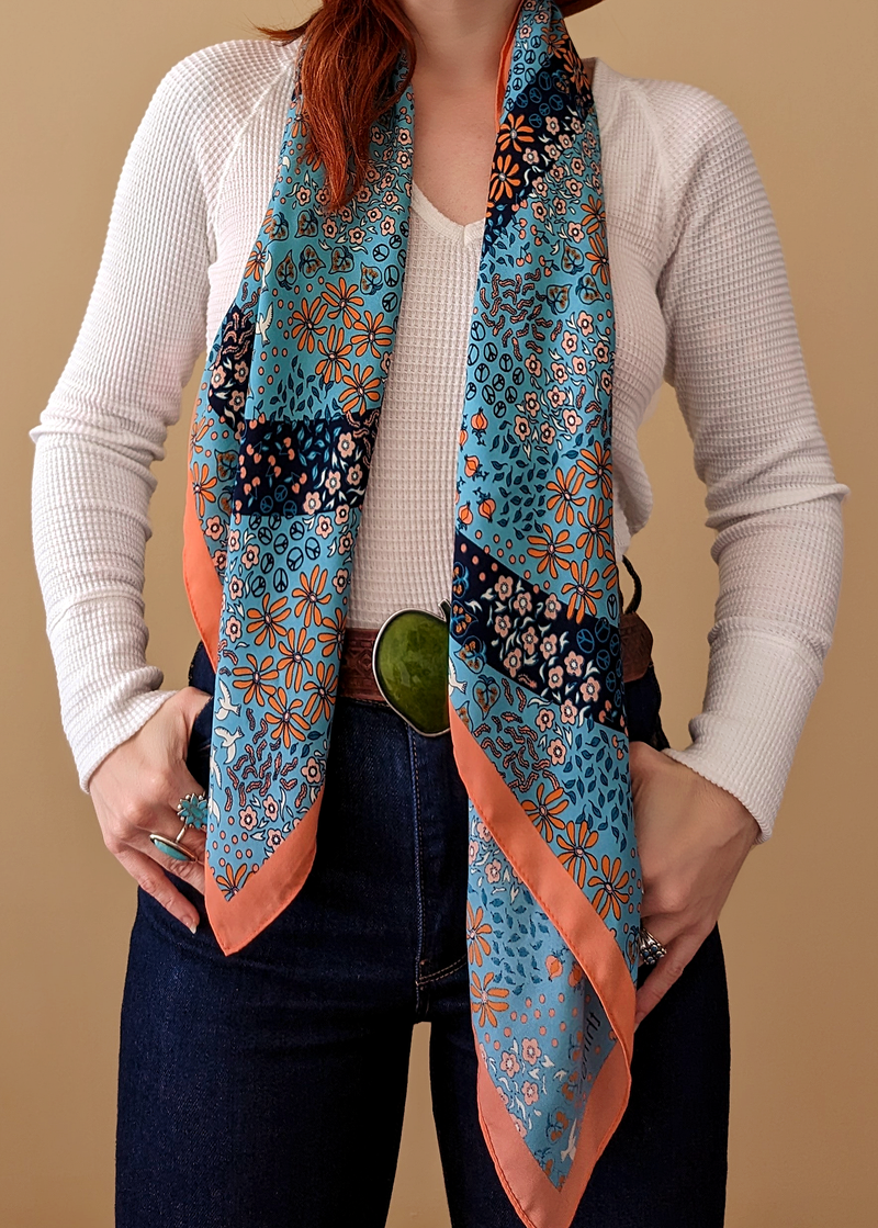 Retro Floral Peace Sign Oversized Square Scarf in peach and blue, with floral and dove pattern all over. By Nice Things by Paloma S.