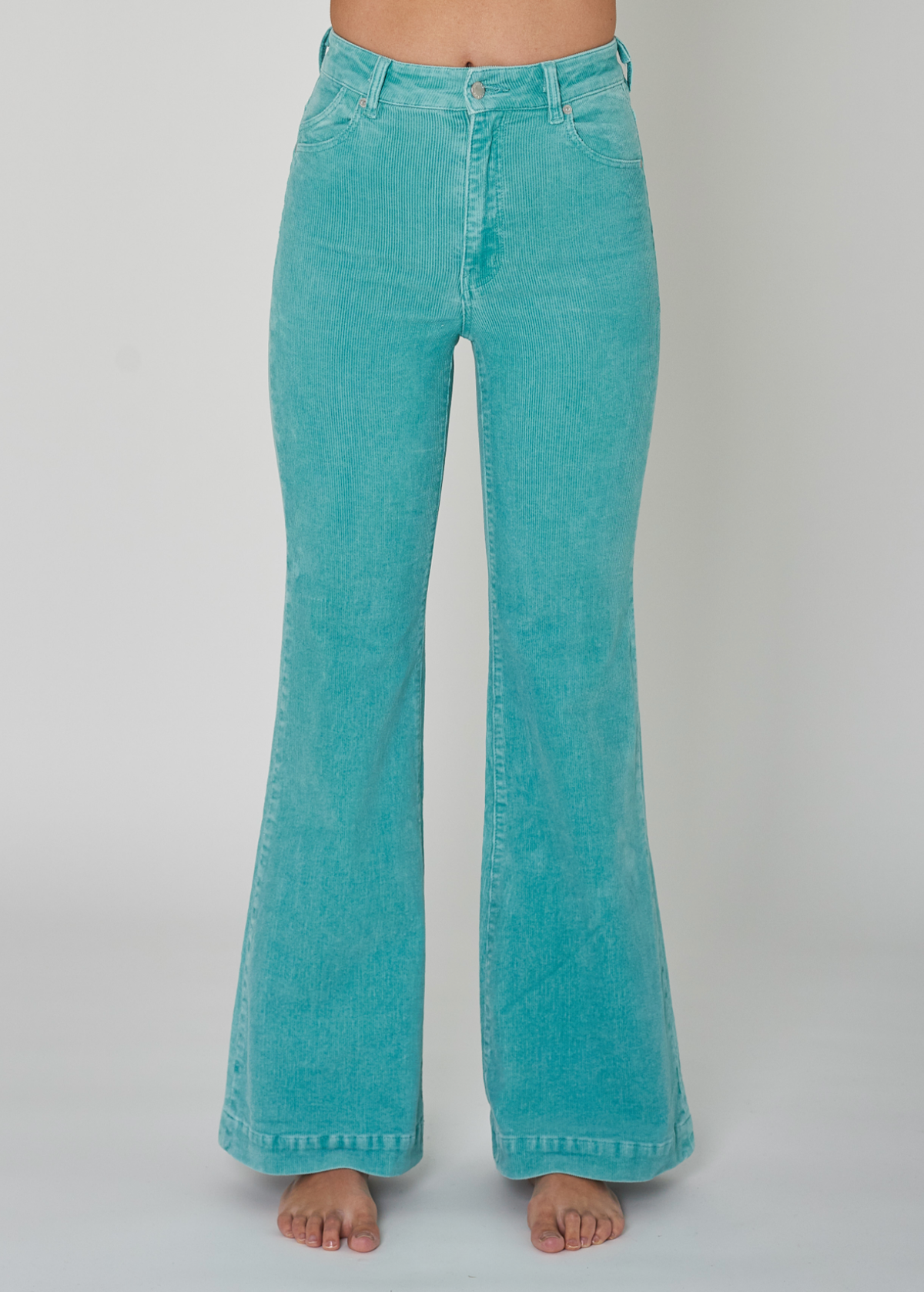 Rolla's Jeans Turquoise Corduroy Flares. 70s inspired bell bottoms with a high rise waist, velvety thin wale corduroy, and a flare leg